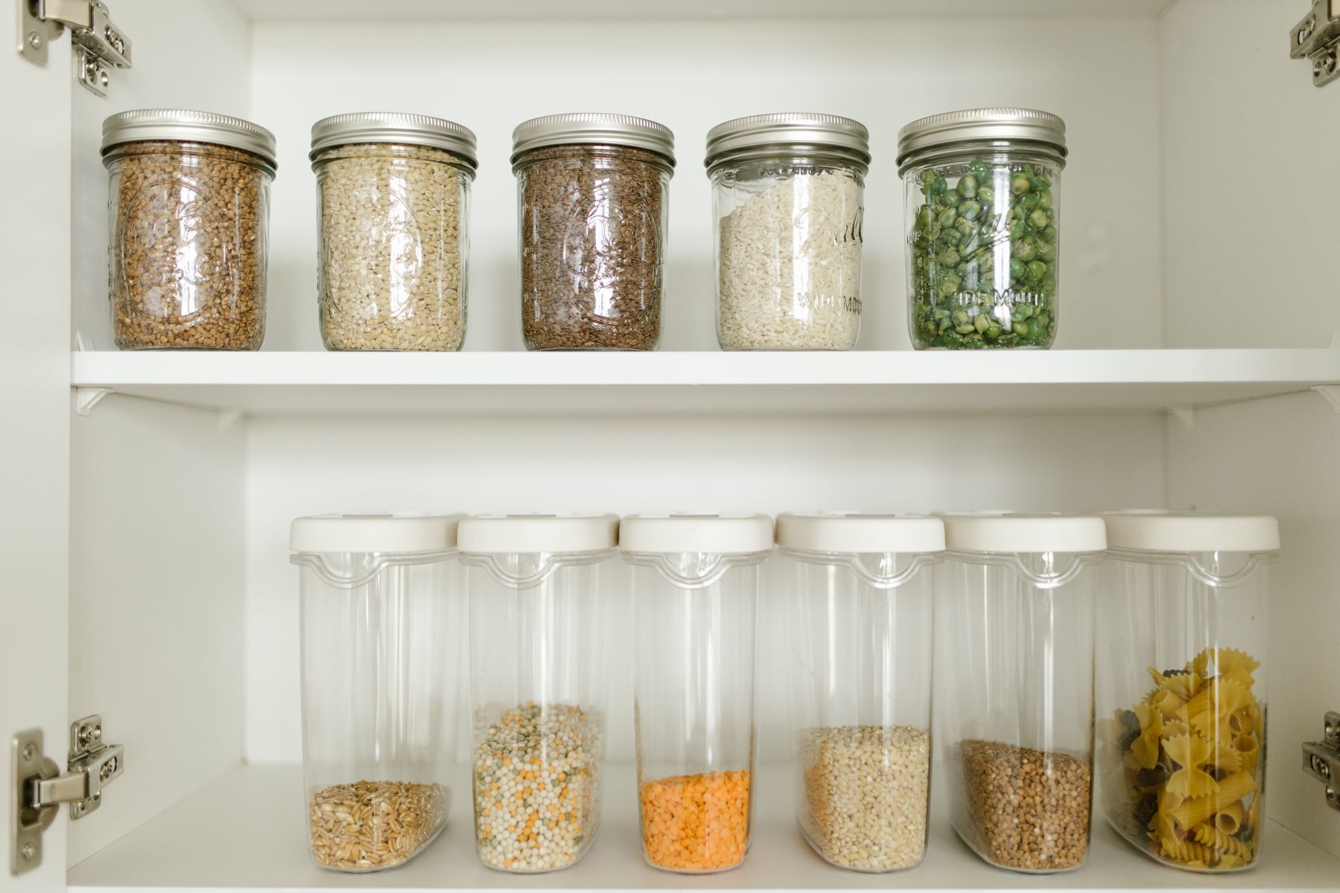 Organized pantry with jars and containers